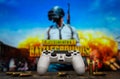 Odessa, Ukraine - May 13, 2019. White playstation 4 gamepad on the background of the game PUBG.  PLAYERUNKNOWN`S BATTLEGROUNDS Royalty Free Stock Photo