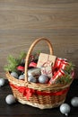 Odessa, Ukraine - November 10, 2021: Concept of gift with Christmas basket on dark table