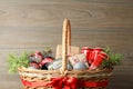 Odessa, Ukraine - November 10, 2021: Concept of gift with Christmas basket on wooden background