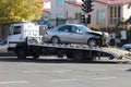 ODESSA, UKRAINE - October 16, 2019: Car accident, head-on collision. A tow truck loads a wrecked car after an accident. Traffic