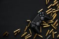 Odessa, Ukraine September 21, 2019 Gamepad playstation 4 on a black wooden background among empty cartridges. A concept