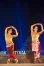 Two Male Odissi dancer performing Odissi Dance on stage at Konark dance festival, Odisha, India. Royalty Free Stock Photo