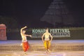 Two Male Odissi Dancers performing Odissi dance on stage at Konark Dance Festival 2020, Konark Odisha, India. Royalty Free Stock Photo