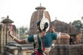 Odissi Dancer wears traditional costume with hand mudra at Mukteshvara Temple Royalty Free Stock Photo