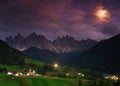 The church Santa Maddalena with the impressive Odle Mountains Group in the background by night. Royalty Free Stock Photo