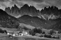 The church Santa Maddalena with the impressive Odle Mountains Group in the background at sunset. Royalty Free Stock Photo