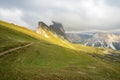 Odles group under the clouds. Trail from Seceda. Dolomites Royalty Free Stock Photo