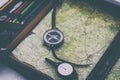 . odometer in focus. military commander& x27;s bag with a compass. map for the route. there is toning Royalty Free Stock Photo