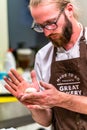 Odziena / Latvia - August 24th, 2018: Male Chef Preparing Bread Dough for Selfmade Bread and Patties