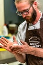 Odziena / Latvia - August 24th, 2018: Male Chef Preparing Bread Dough for Selfmade Bread and Patties