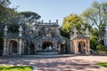 Oeiras, Lisboa PORTUGAL - 10 March 2019 - Poets Waterfall with God River figure in the center in the gardens of the Marquis of Pom