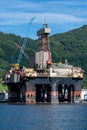 Oilplatform inside the Norwegian fjord for maintance at ships yard