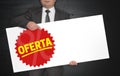Oferta poster is held by businessman Royalty Free Stock Photo
