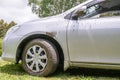 Off the beaten track: rental car splashed with mud after road tr
