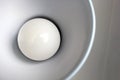 Off light bulb in white desk lamp. Close-up photo.