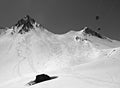 Black and white off piste skiing tracks left on the mountainside Royalty Free Stock Photo