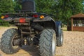 Off-road ATV on the sandy beach of the sea, quad bike rides, active recreation, tourism Royalty Free Stock Photo