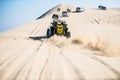 Off road buggy car in the sand dunes of the Qatari desert.