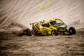 Off road buggy car in the sand dunes of the Qatari desert.