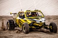 Off road buggy car in the sand dunes of the Qatari desert.