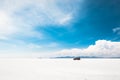 Off-road car driving on Salar de Uyuni salt flat in Bolivia Royalty Free Stock Photo