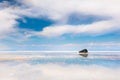 Off-road car driving on Salar de Uyuni salt flat in Bolivia Royalty Free Stock Photo