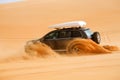 Off-road car fetching a dune, Libya - Africa Royalty Free Stock Photo