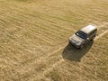 Off road car on the forest and field summer dirt road top view f Royalty Free Stock Photo