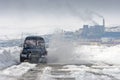 Off-road car at the ice crossing over the Anadyr estuary Royalty Free Stock Photo