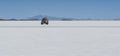 Off-road car in the Salar de Uyuni is largest salt flat in the World UNESCO World Heritage Site - Altiplano, Bolivia