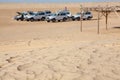 Off-road car at stoppage in desert not in focus Royalty Free Stock Photo