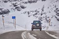 An off-road car transits the Bernina Pass in Switzerland Royalty Free Stock Photo