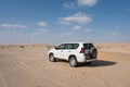 Off road drive in desert on rental Toyota Prado 4x4 car Royalty Free Stock Photo