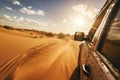 Off-road driving fast in the desert bashing sand dunes