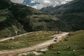 Off road expedition vehicle on the mountain road among Himalaya