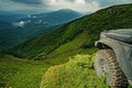 Off-road Jeep car on bad gravel road. Off-road travel on mountain. Offroad car on bad road. Royalty Free Stock Photo