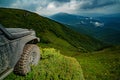 Off-road Jeep car on bad gravel road. Off-road travel on mountain. Offroad car on bad road. Royalty Free Stock Photo