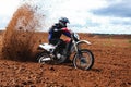 Off-road motorbike driving in dirt. Royalty Free Stock Photo