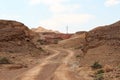 Off-Road path and mountain in crater Makhtesh Ramon, Negev Desert, Israel Royalty Free Stock Photo
