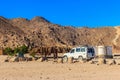 Off road SUV car in bedouin village in Arabian desert near Hurghada, Egypt