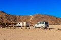 Off road SUV car in bedouin village in Arabian desert near Hurghada, Egypt