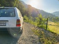 Off-road travel on mountain road. View from behind. Royalty Free Stock Photo