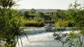 Off-road truck driving the Ivanhoe Crossing, Kununurra, Western Australia, Australia. A concrete causeway over Ord River Royalty Free Stock Photo