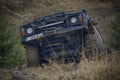 Off-road vehicle brand Nissan overcomes a track Royalty Free Stock Photo