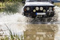 Off-road vehicle crossing river