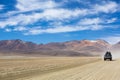 Off-road vehicle driving in the Atacama desert, Bolivia