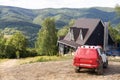 Off-road vehicle goes on the mountain way during the rainy season. Royalty Free Stock Photo