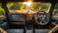 Off-road vehicle interior view with sunlit dirt road ahead Royalty Free Stock Photo