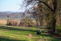 Off road vehicle on a grassy trail in an idyllic rural landscape. Royalty Free Stock Photo