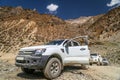 Off-road vehicles on the background of the mountains